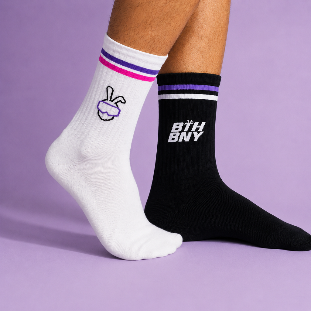 #MIXED one white and one black boothbunny paw sock, worn as a pair