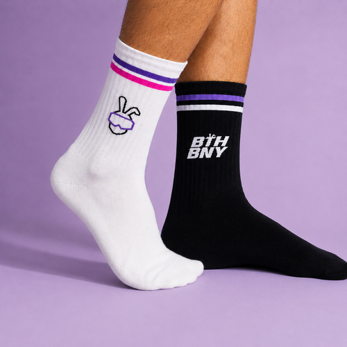 #MIXED one white and one black boothbunny paw sock, worn as a pair